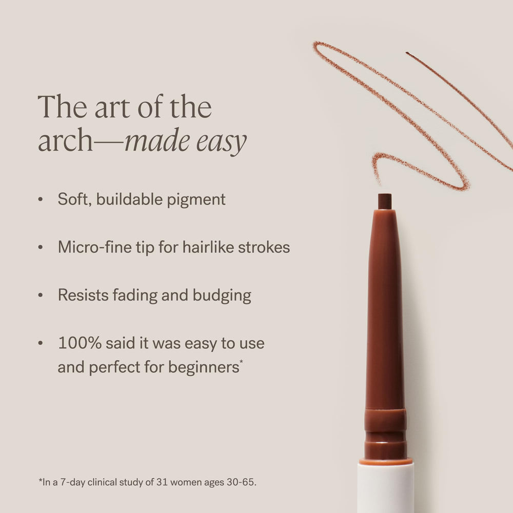 ILIA brow pencil in hand demonstrating compact size and travel convenience