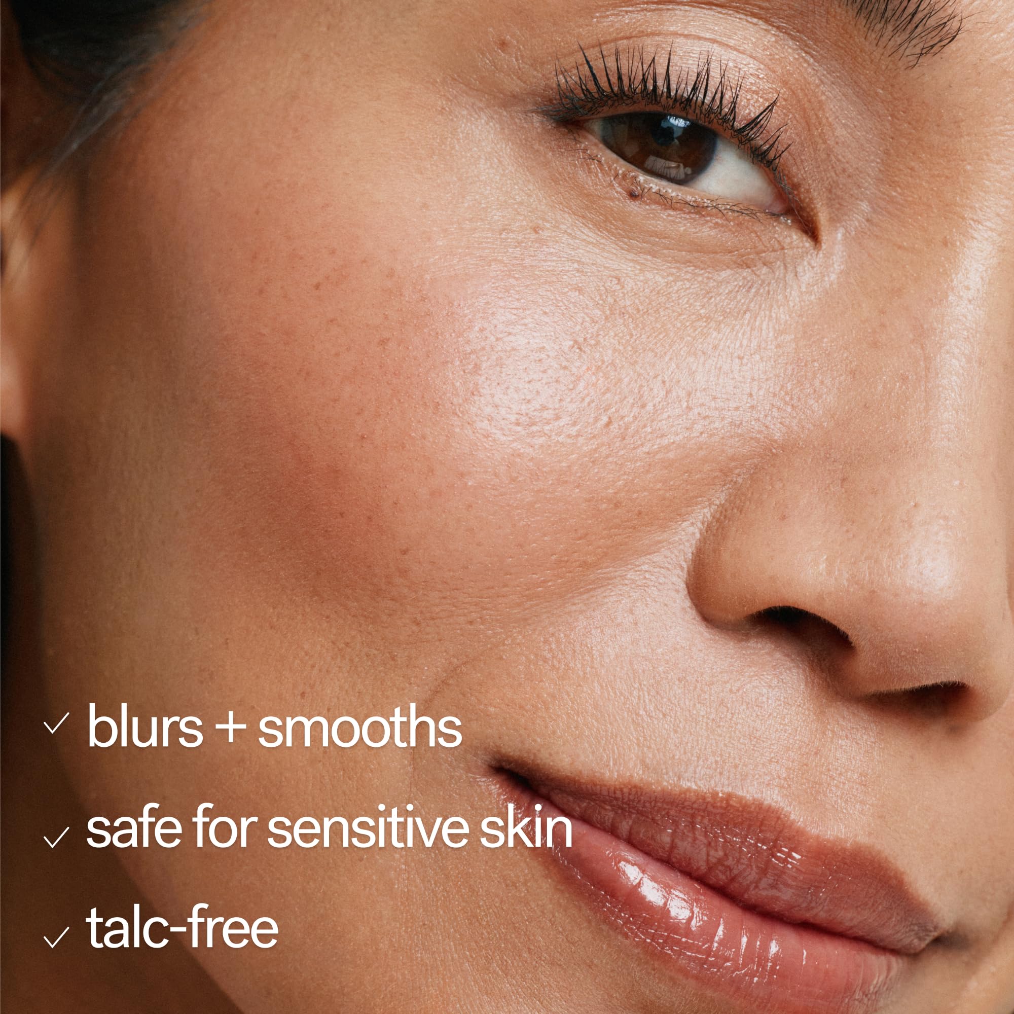 ILIA on model forehead demonstrating natural-looking shine control