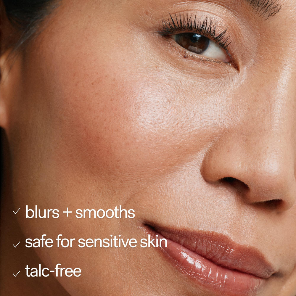 ILIA on model forehead demonstrating natural-looking shine control