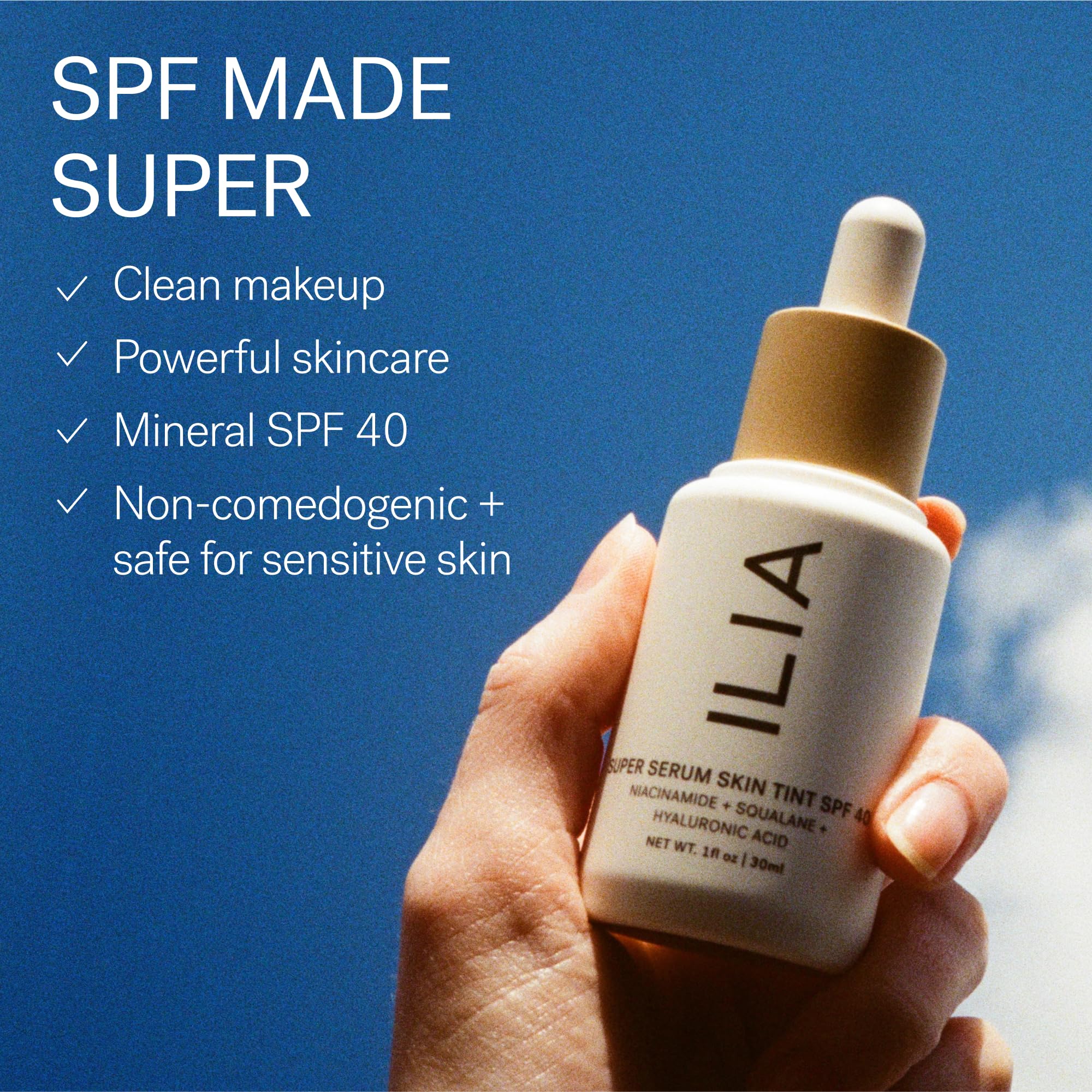 ILIA 30 ml bottle next to a coin for scale showing travel-friendly size benefit