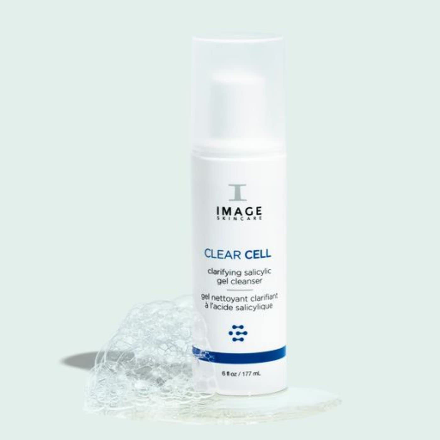 IMAGE Skincare next to common bottle showing 6 fl oz scale and travel convenience