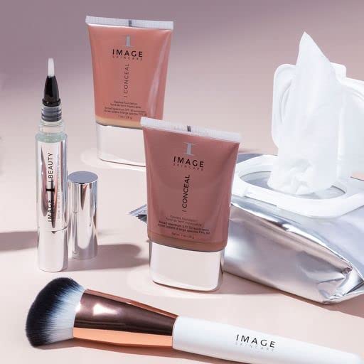 IMAGE Skincare pack held in hand showing compact travel-friendly size