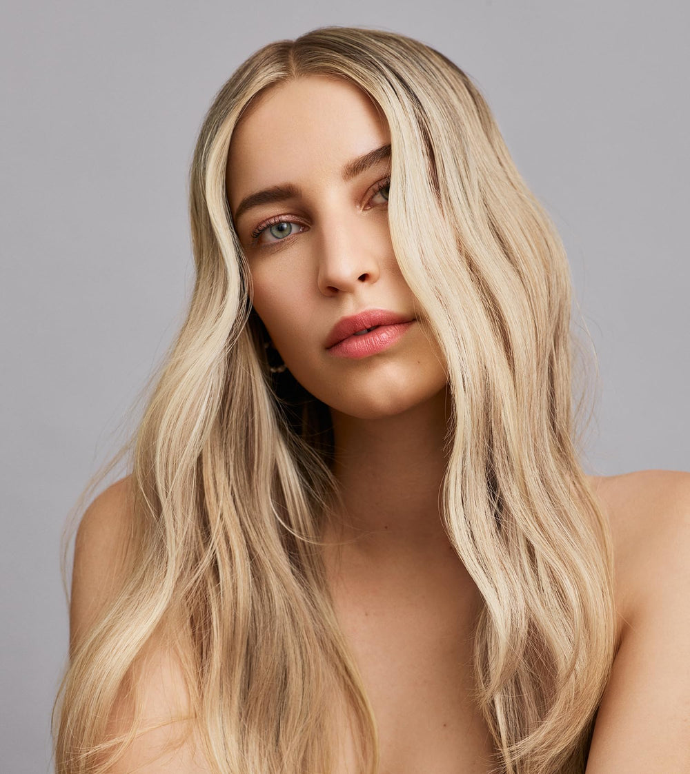 IN COMMON outdoor lifestyle image showing glossy hair and UV defense