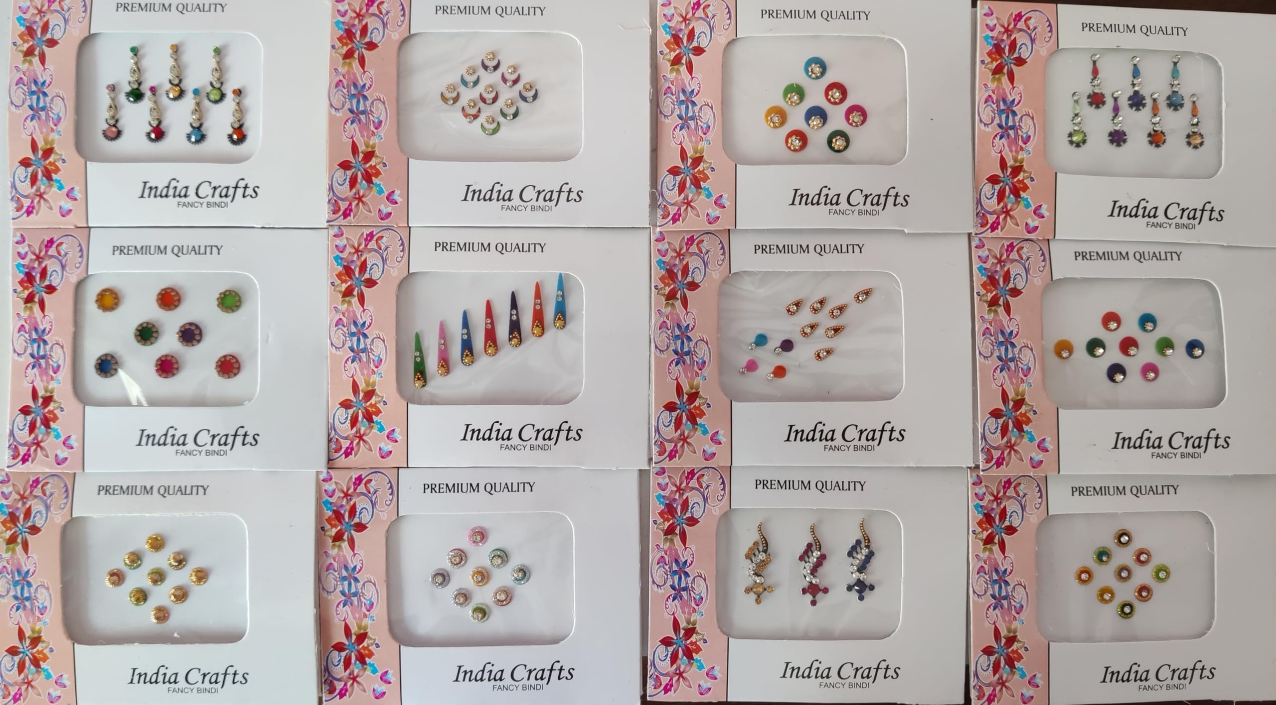 India Crafts scale comparison with fingers to show bindi sizes