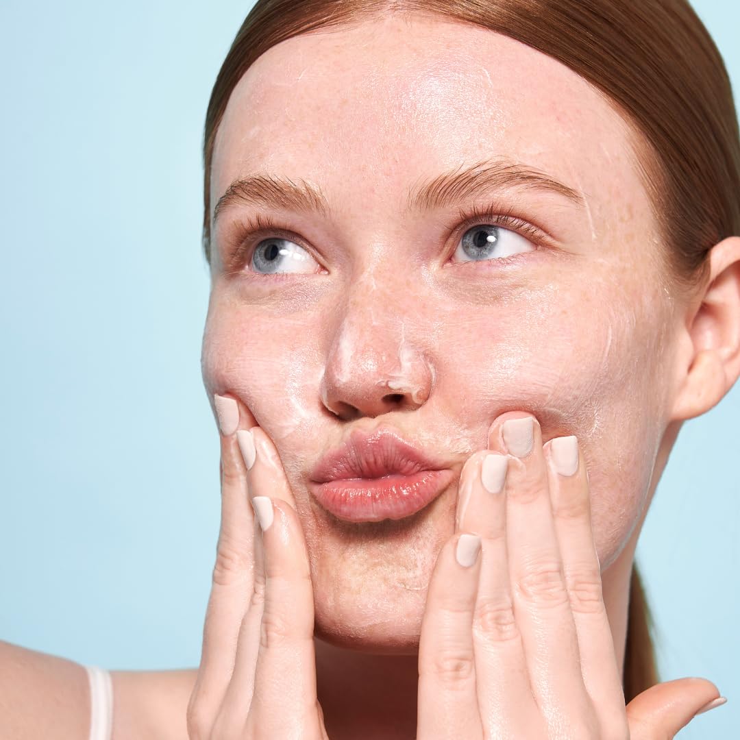 Indie Lee cleanser applied to face showing gentle makeup removal