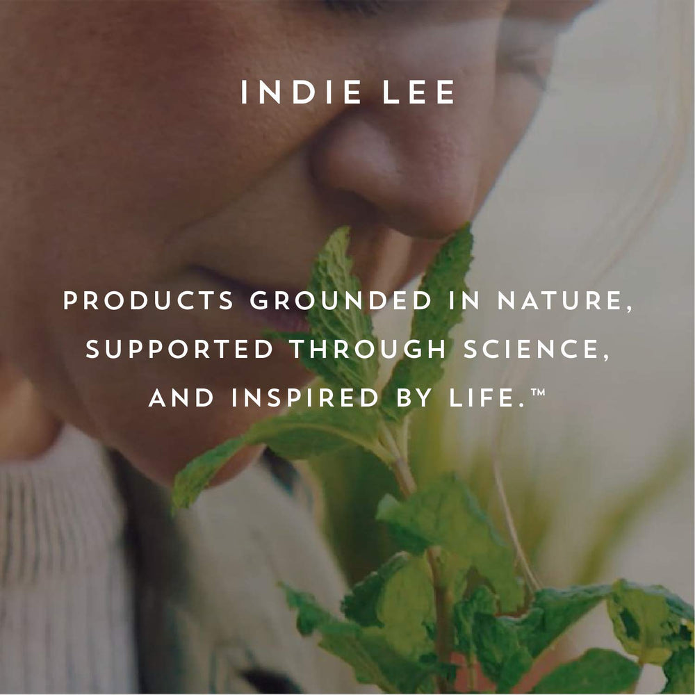 Indie Lee layering with serum to seal moisture and enhance skin glow
