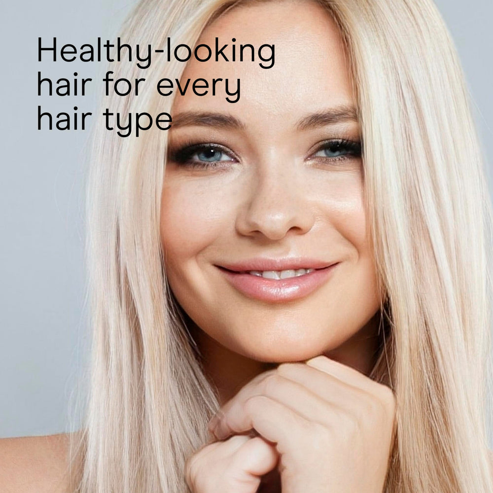 INFINITIPRO by Conair curling hair with a 1-inch plate to create polished waves
