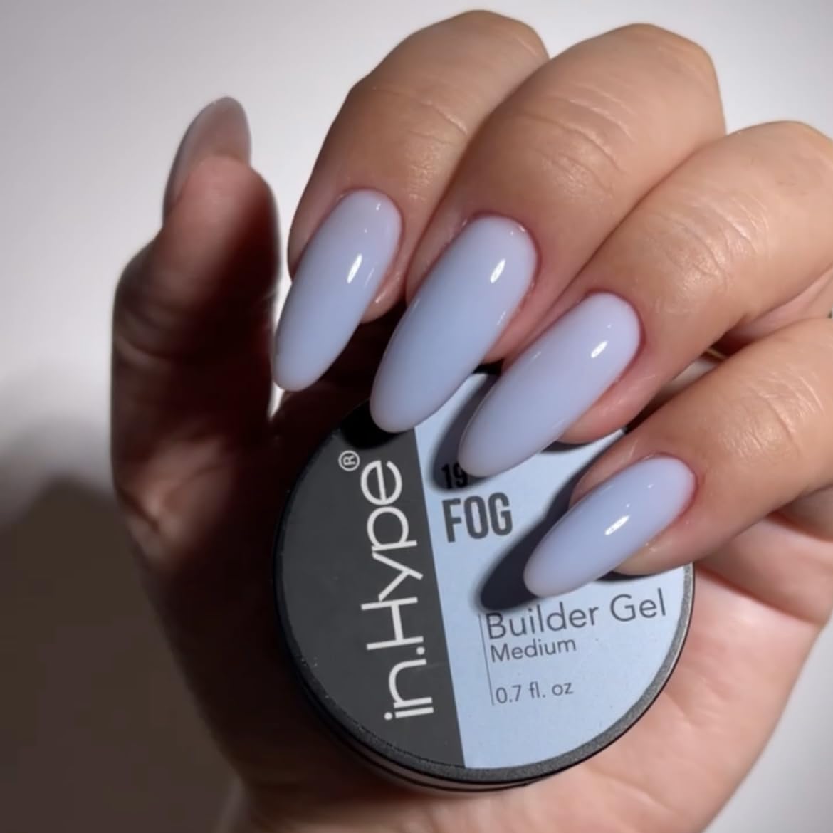 IN.HYPE gel applied on nail form demonstrating controlled build and arch creation benefit