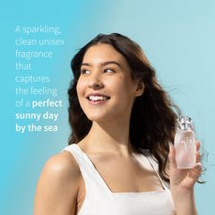 Inis the Energy of the Sea bottle on a beach backdrop conveying coastal inspiration and energy