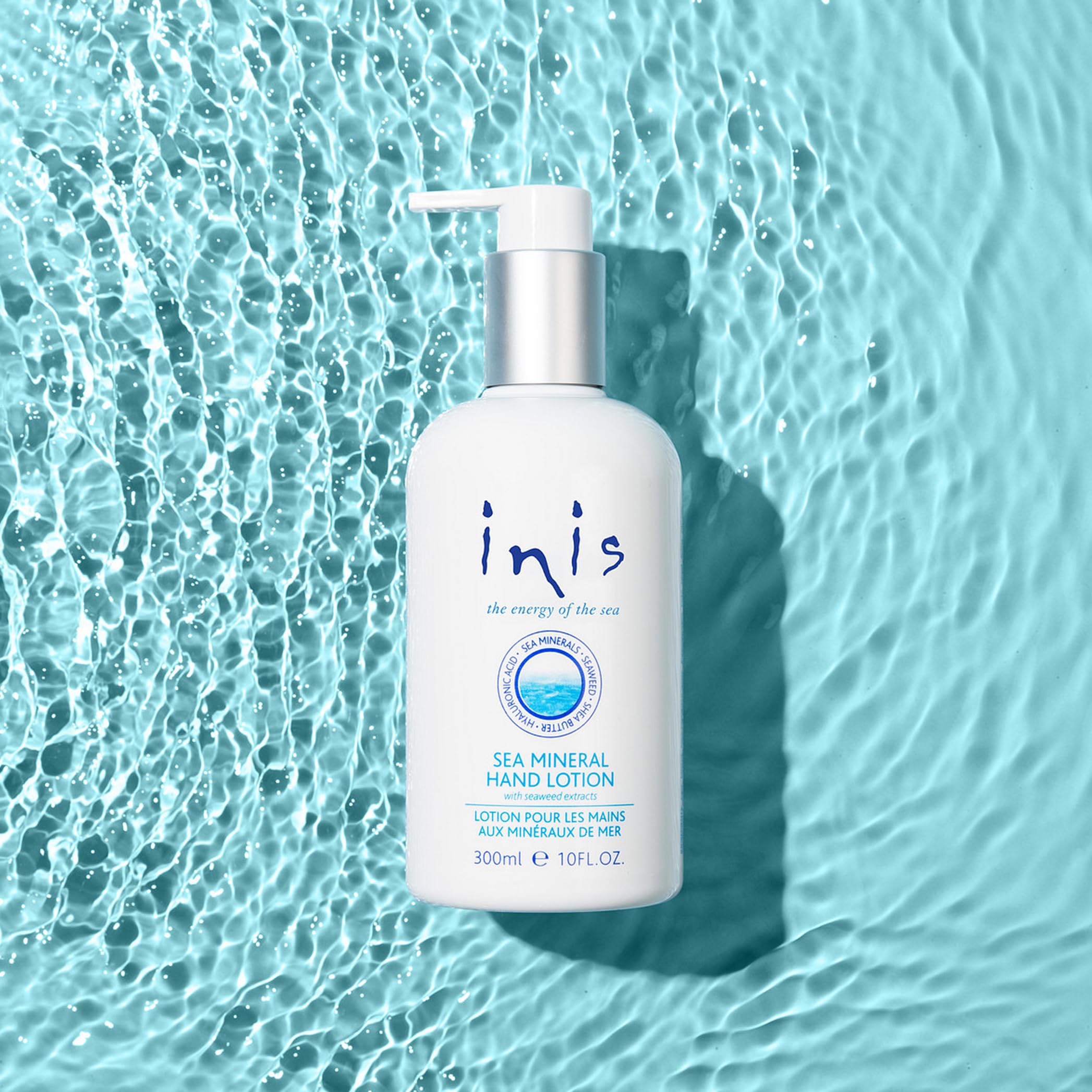 Inis hand lotion on bathroom shelf by the sea evoking fresh fragrance