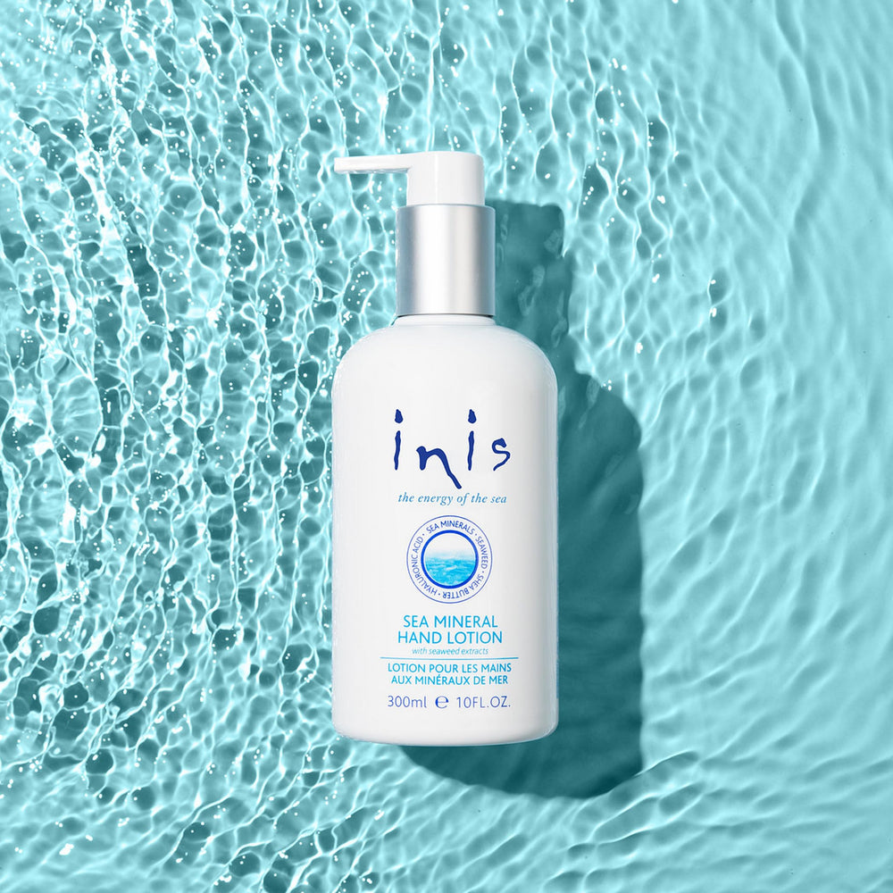 Inis hand lotion on bathroom shelf by the sea evoking fresh fragrance