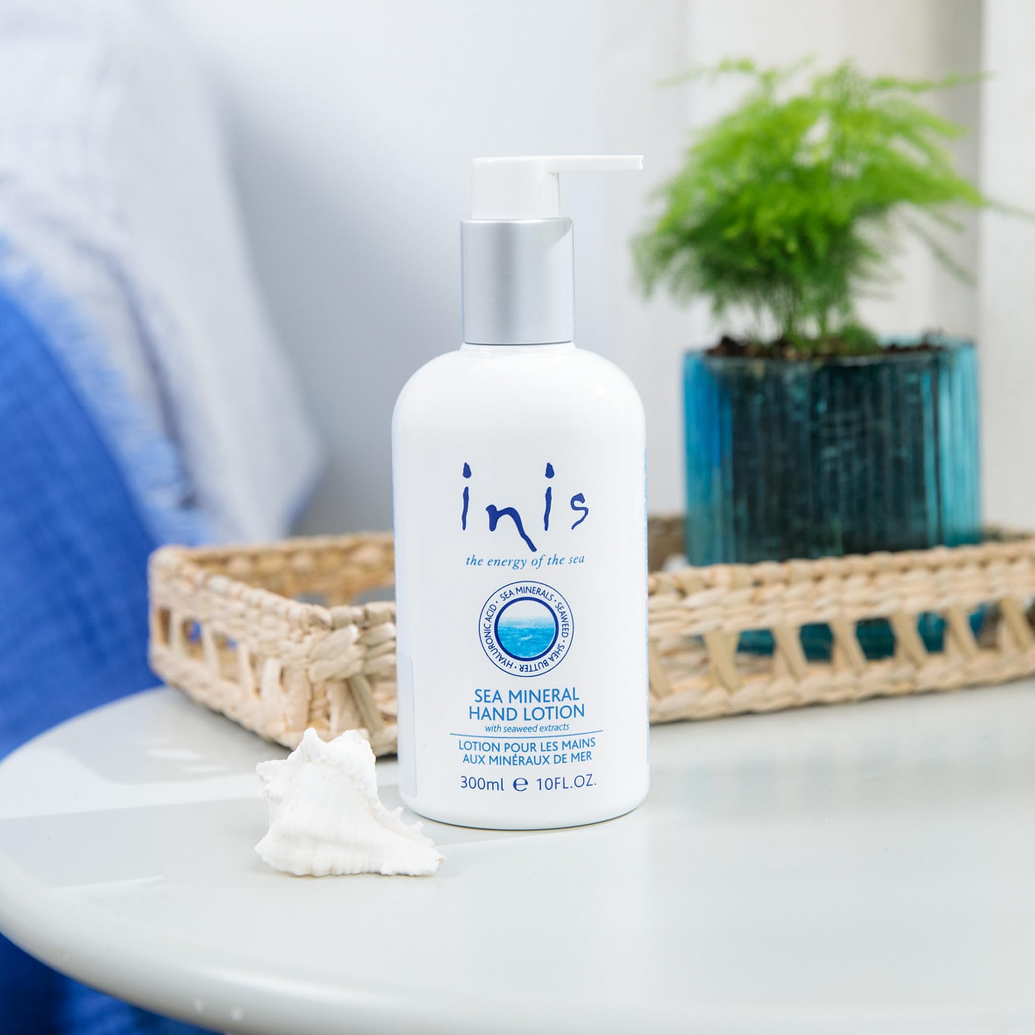 Inis hand lotion open cap and creamy texture demonstrating fast absorption