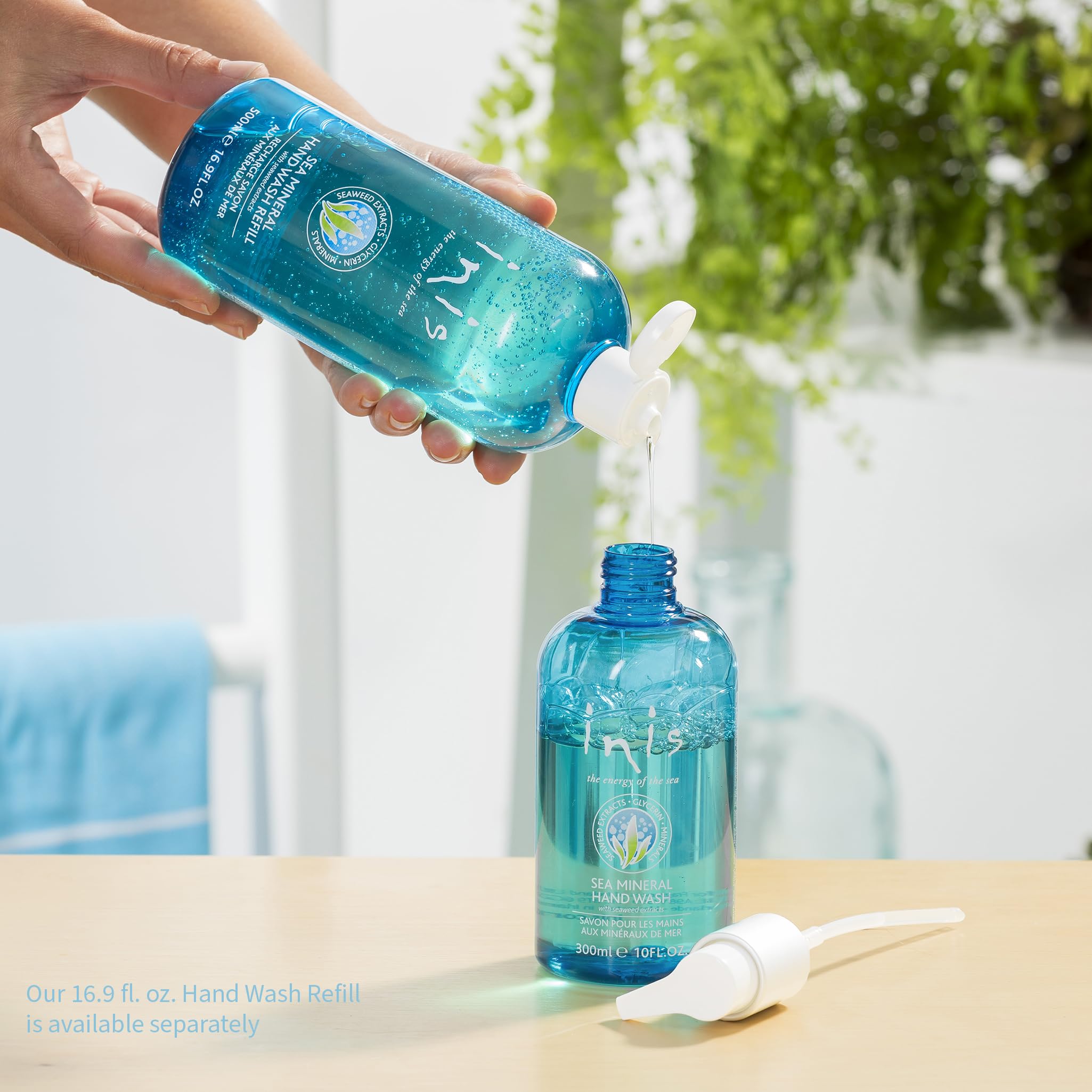 Inis bottle beside a common soap for scale demonstrating compact 10 fl oz size
