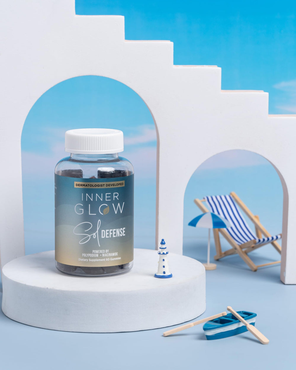 Inner Glow bottle beside sunscreen to show complementary sun-care use