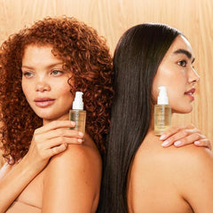 INNERSENSE applying drops to scalp showing targeted nourishment benefit