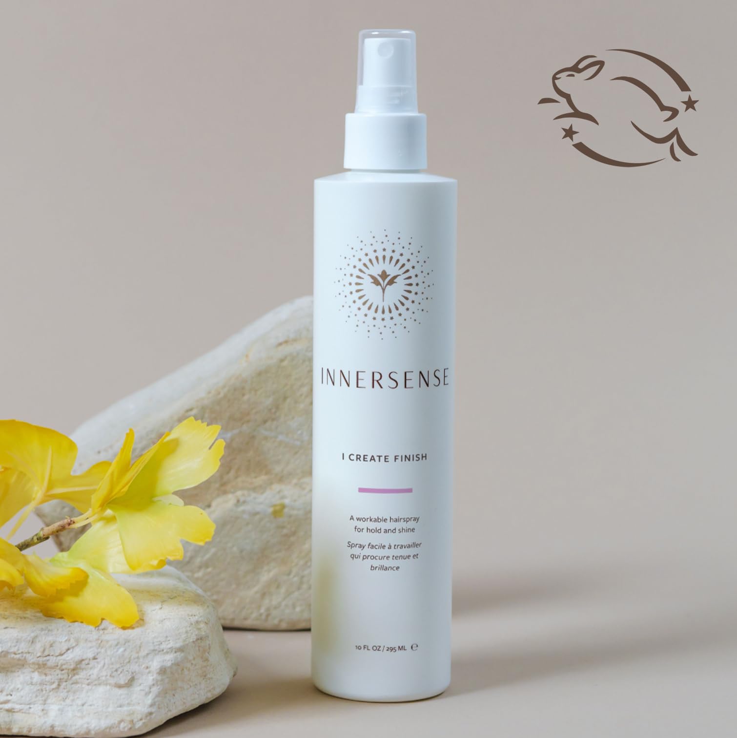 INNERSENSE close-up nozzle showing fine mist spray for even, lightweight application