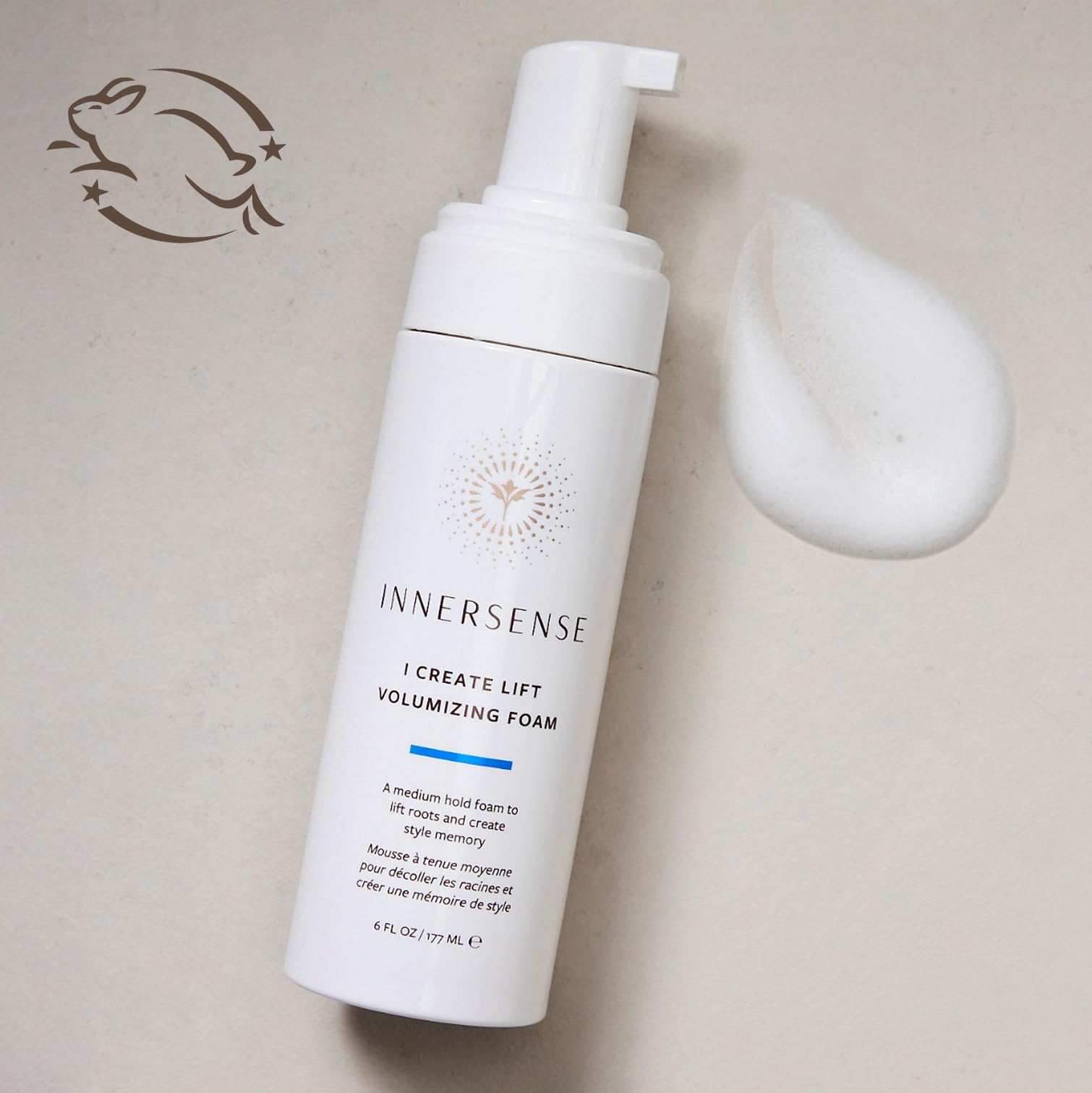 Innersense I Create Lift foam texture on hand illustrating airy mousse and easy distribution