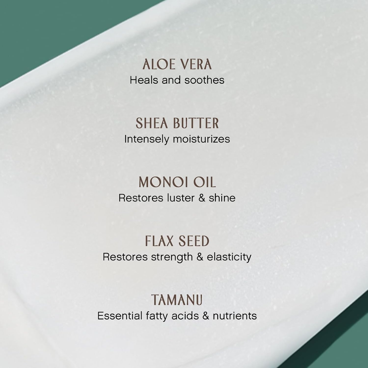 INNERSENSE organic ingredients flatlay showing shea, monoi and oils for nourished hair