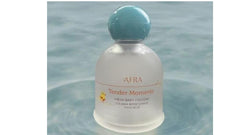 Ioly's bottle held in hand showing size and scale benefit: travel-friendly