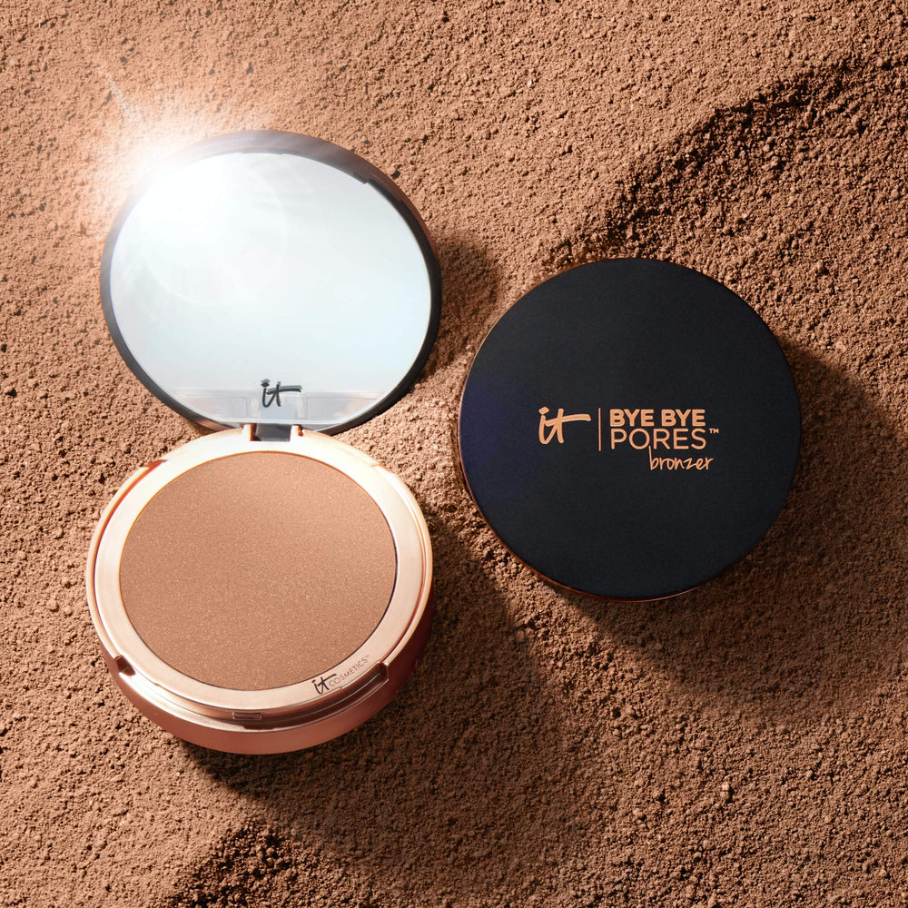 Model wearing IT Cosmetics bronzer giving natural sun-kissed, pore-refined glow