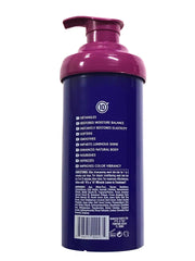 It's a 10 Miracle Hair Mask creamy texture on fingertips, demonstrating deep-hydration benefits