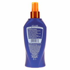 It's a 10 Haircare spray being applied to wet hair for detangling and protection