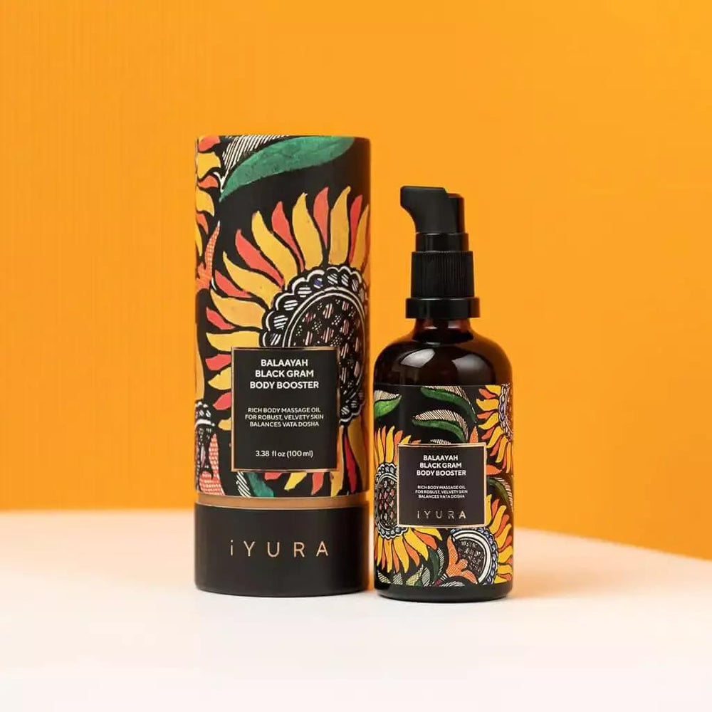 The Ayurveda Experience Balaayah bottle next to a hand for scale and easy dosing benefit