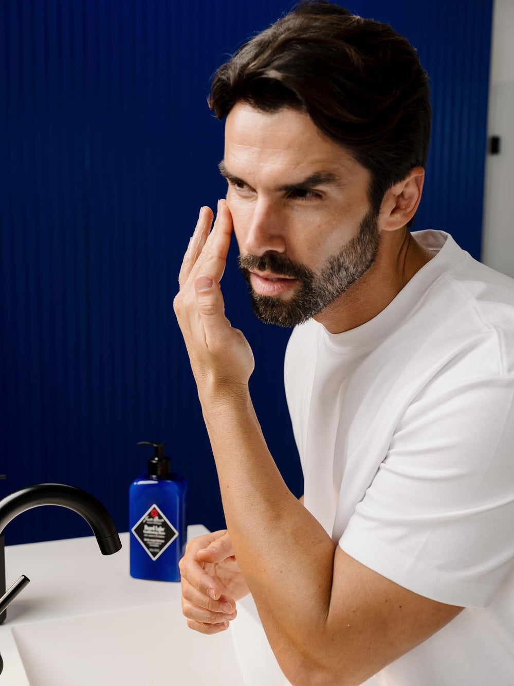 Jack Black Beard Lube applied while shaving illustrating smooth glide benefit