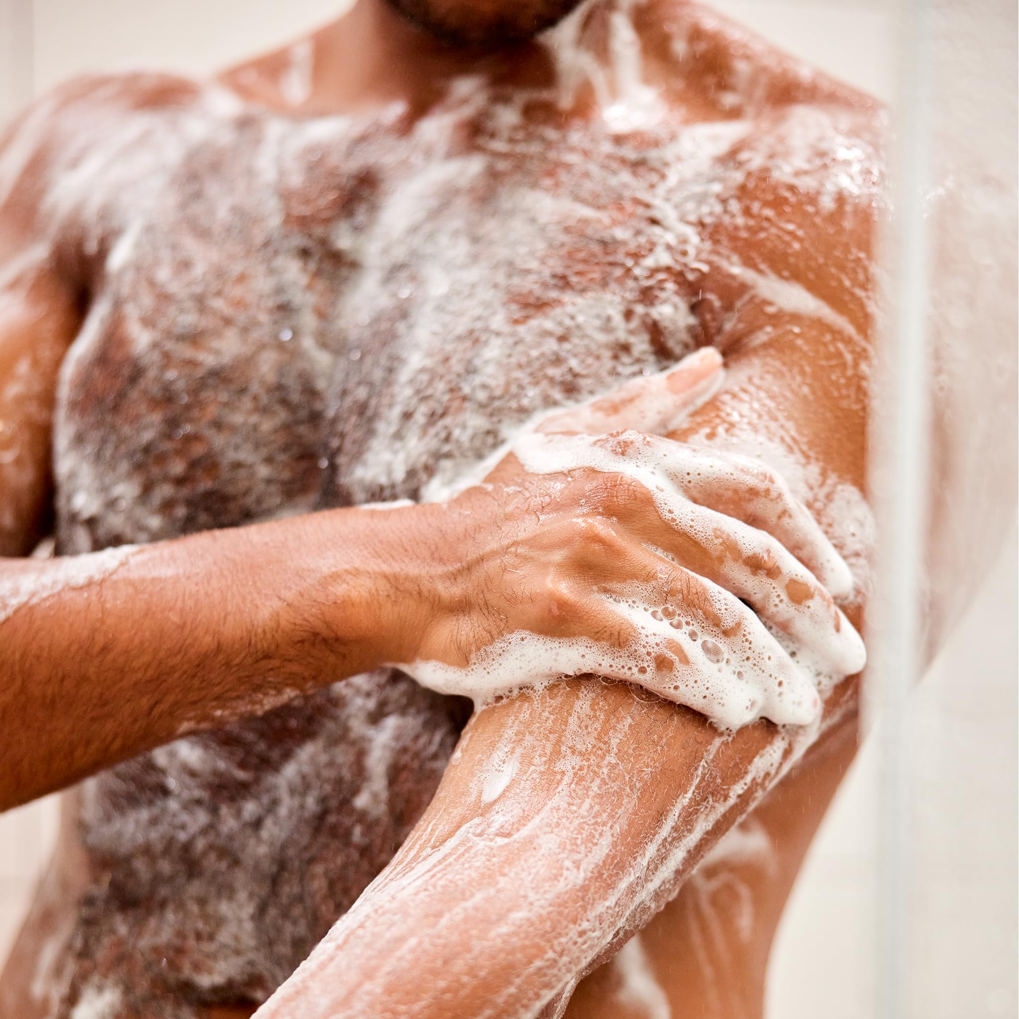 Jack Black in-shower use with man applying cleanser for convenient two-in-one routine benefit