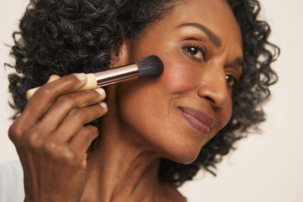 jane iredale brush applying Awake blush for effortless cheek definition