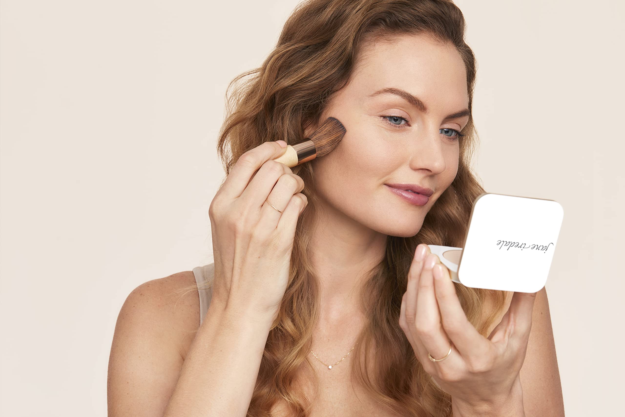 jane iredale open compact with refill installed for easy snap-in replacement