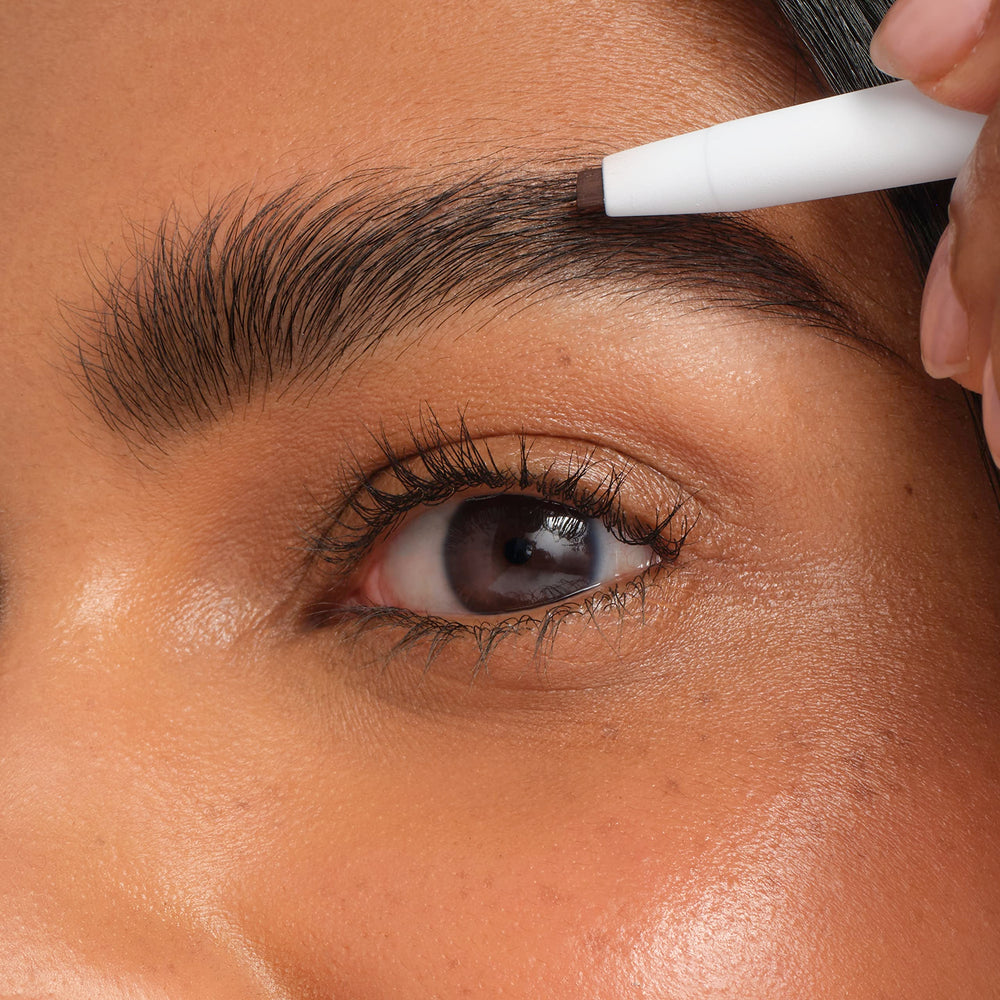 jane iredale PureBrow in makeup bag lifestyle shot for on-the-go brow touch-ups