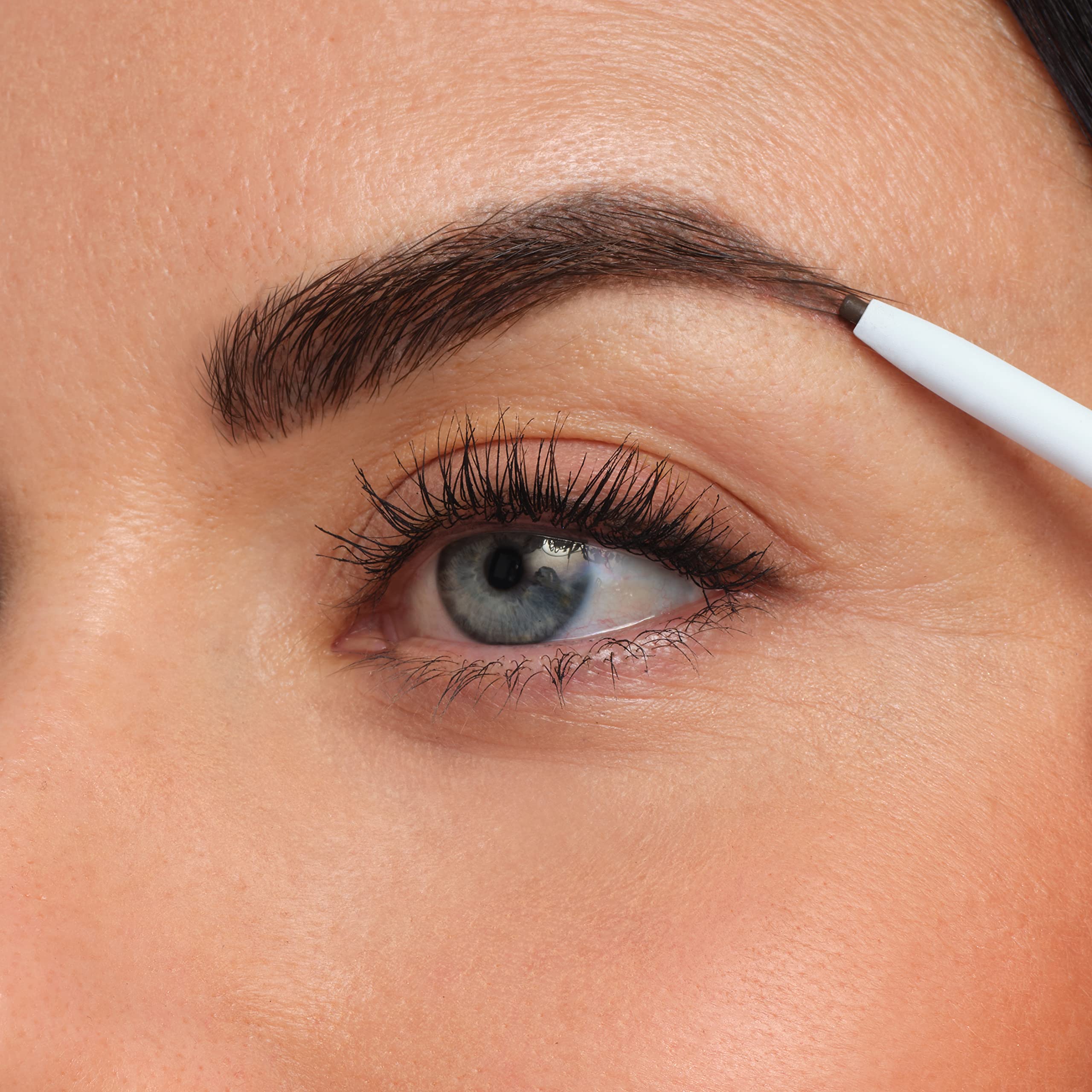 medium brown swatch stroke from jane iredale pencil showing natural blendable color