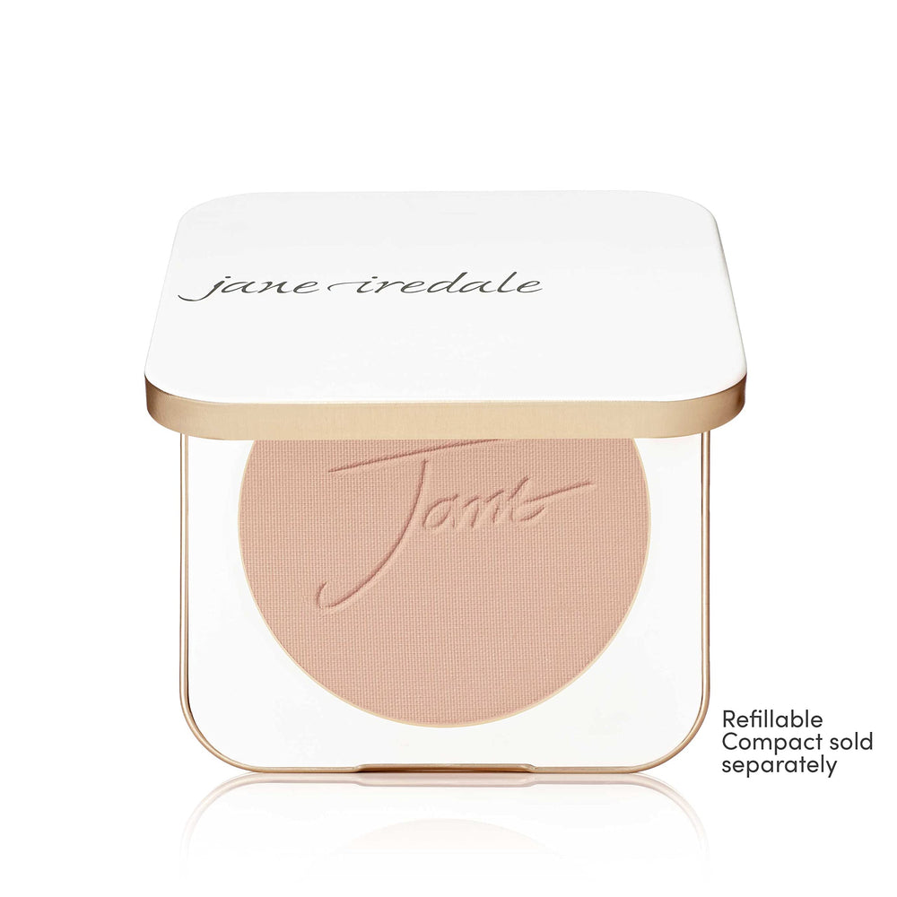 jane iredale swatch on arm showing honey bronze tone and buildable medium coverage