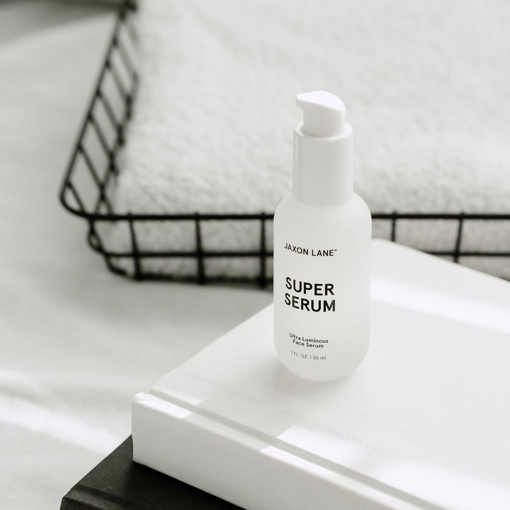 JAXON LANE serum in outdoor scene illustrating daily-use convenience