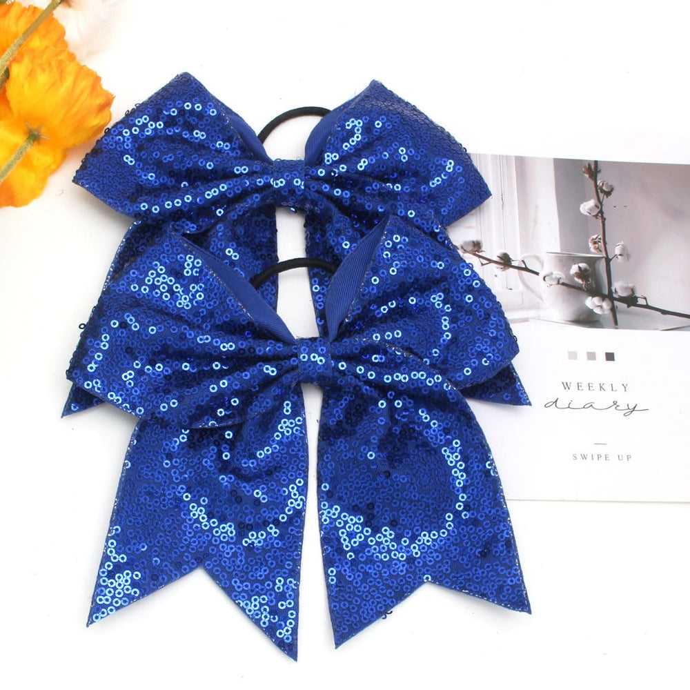 Jeffan bow worn in ponytail demonstrating secure fit and shine