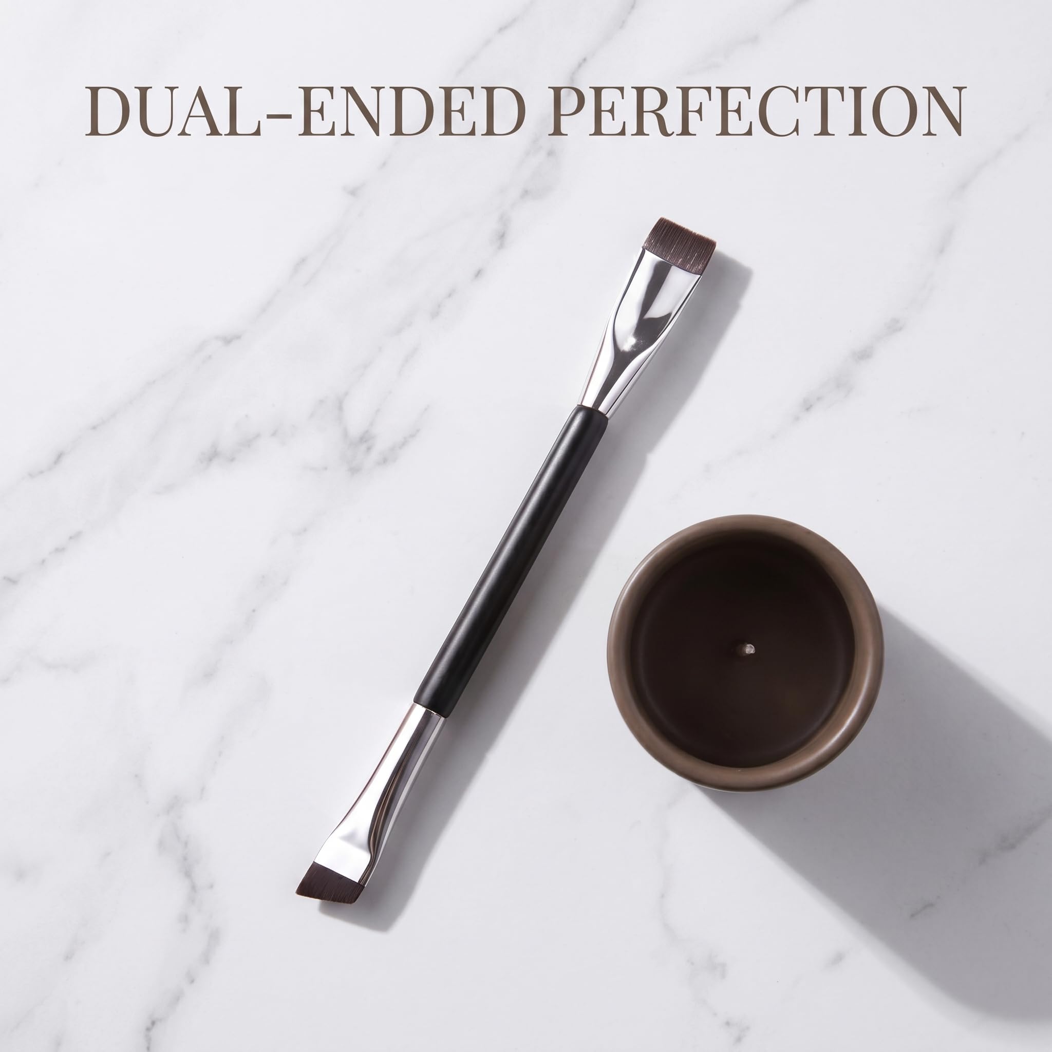 JEZTDKLE brush next to eyeliner showing scale for travel and portability benefit