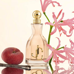 JIMMY CHOO ingredient display with mandarine peach and floral accents