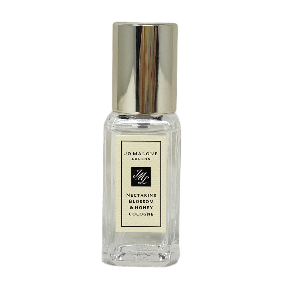 Jo Malone travel bottle front view showing compact design and easy portability benefit