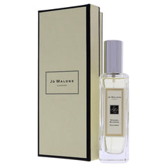 Jo Malone Orange Blossom on a spring table conveying fresh floral mood and everyday versatility