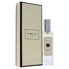Jo Malone Orange Blossom being applied to wrist demonstrating long-lasting diffusion with body heat
