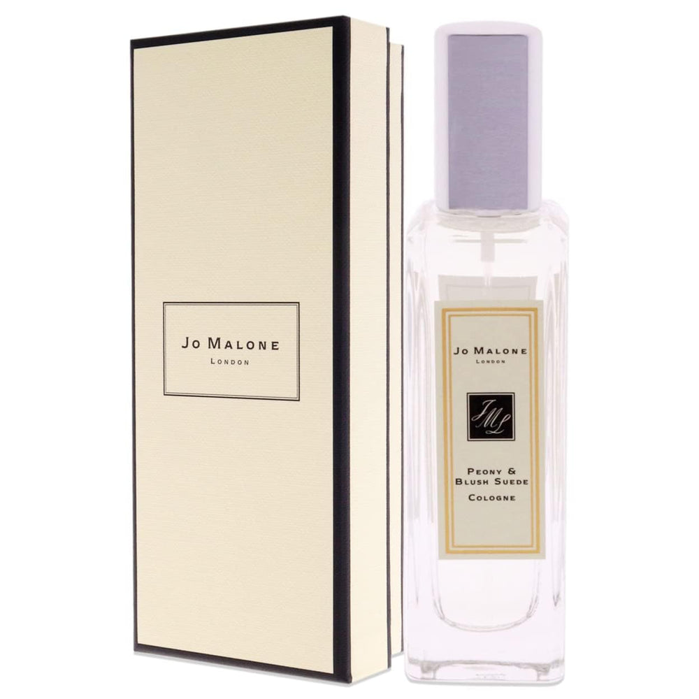 Jo Malone bottle in hand for scale showing 1.0 ounce portability and travel convenience