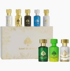 Jo Milano close-up of Emerald, Topaz, Bonus bottles highlighting label detail and luxury finish