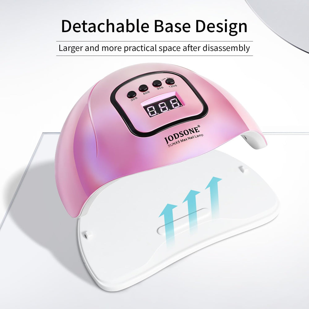 JODSONE lamp next to a hand to show scale and how it fits standard manicure sessions