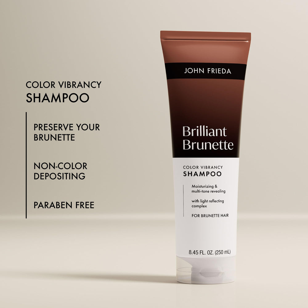 John Frieda shampoo being dispensed to show creamy texture and easy use