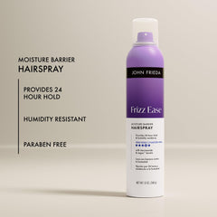 John Frieda mist sprayed on styled hair to set finish