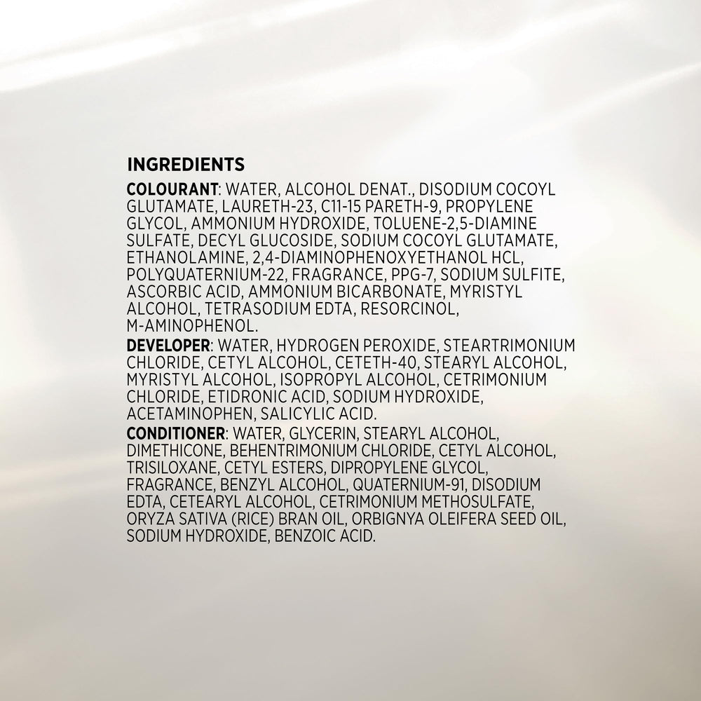 John Frieda foam applied at roots to demonstrate full grey coverage