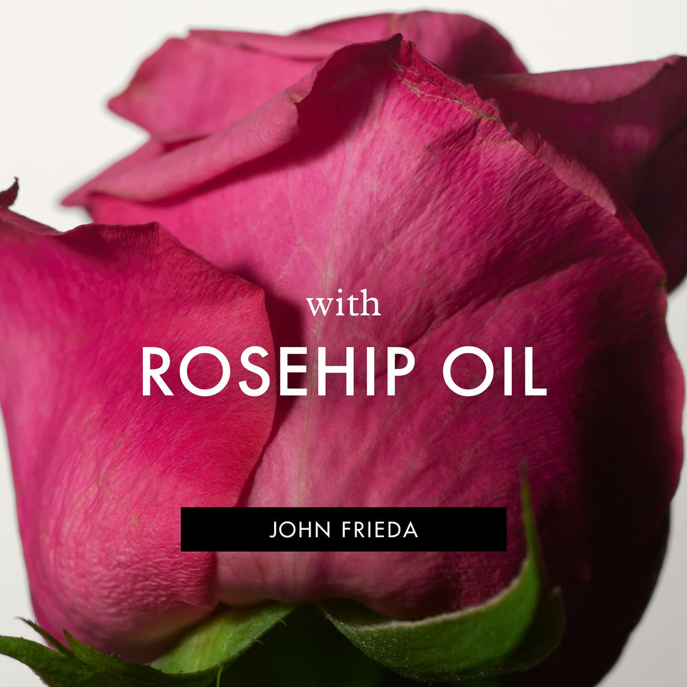 John Frieda can in hand for scale illustrating 7.2 fl oz size