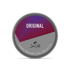 JOHNNY B. open pomade texture on finger, smooth application benefit