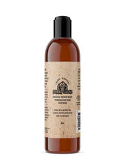 Johnny Slicks front packaging showing bottle and rugged scent benefit